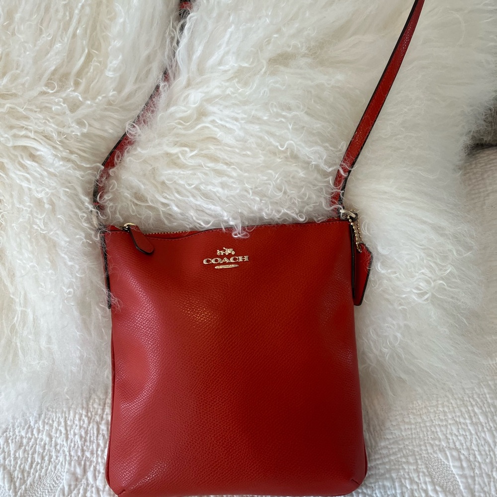 Coach North South crossgrain leather crossbody bag Carmine